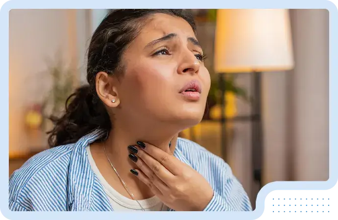 Symptoms of bilateral vocal cord paralysis including breathing difficulty